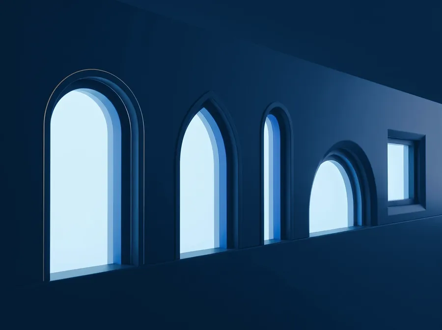 A wall of arched windows, each a different shape