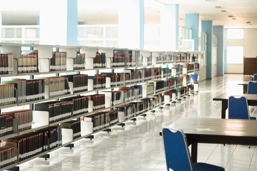 Bright library shelves and tables
