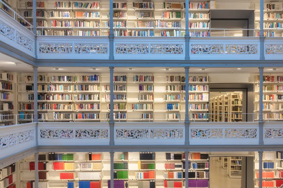 Tiered library galleries, blue ironwork