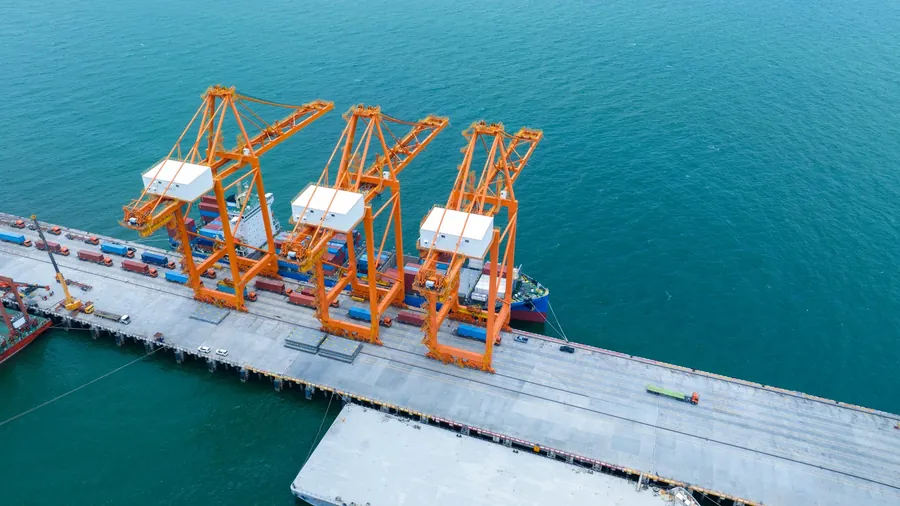 Orange quay cranes on container berth