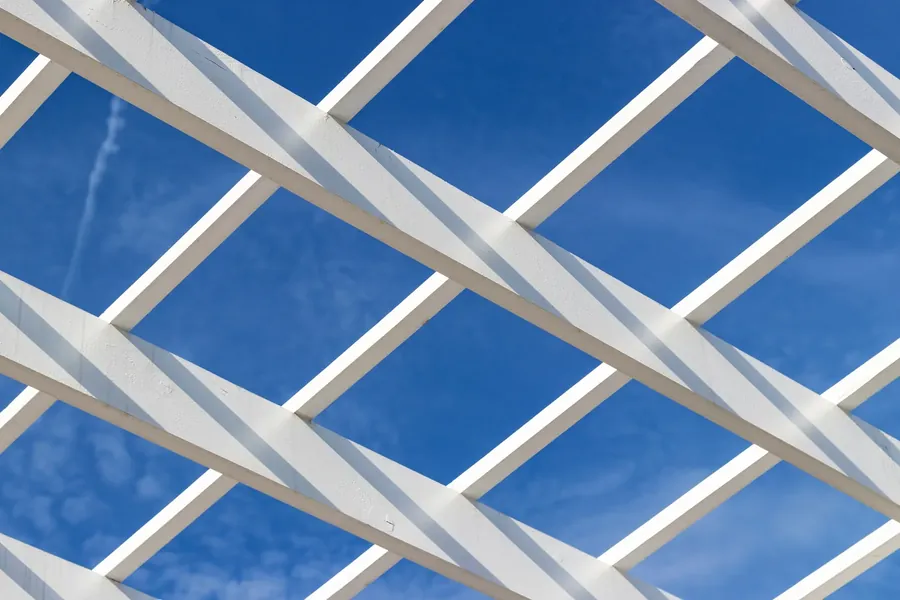 White lattice against deep blue sky